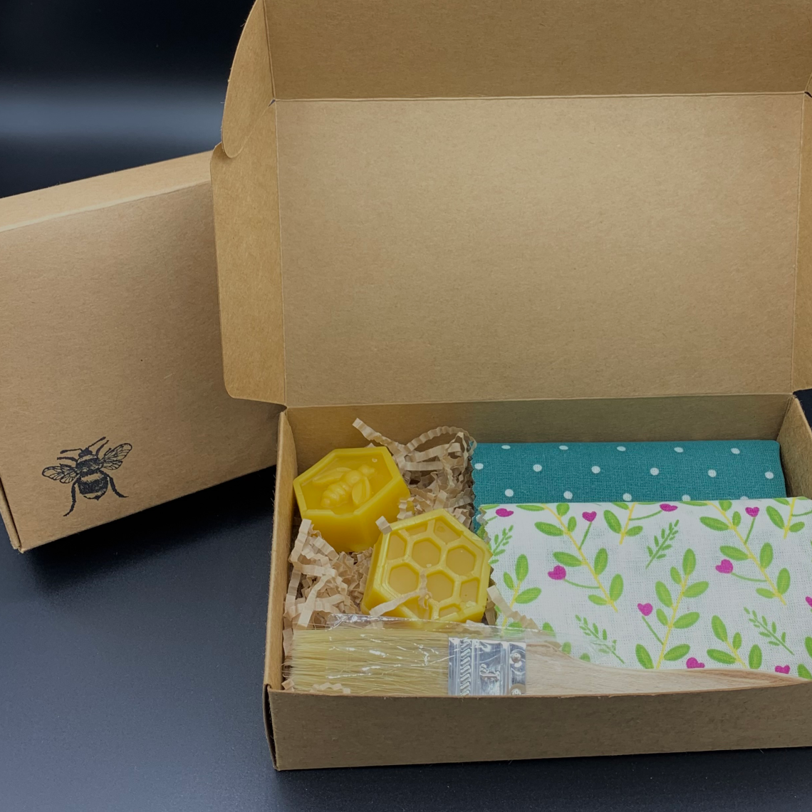 Box with wax making kit in